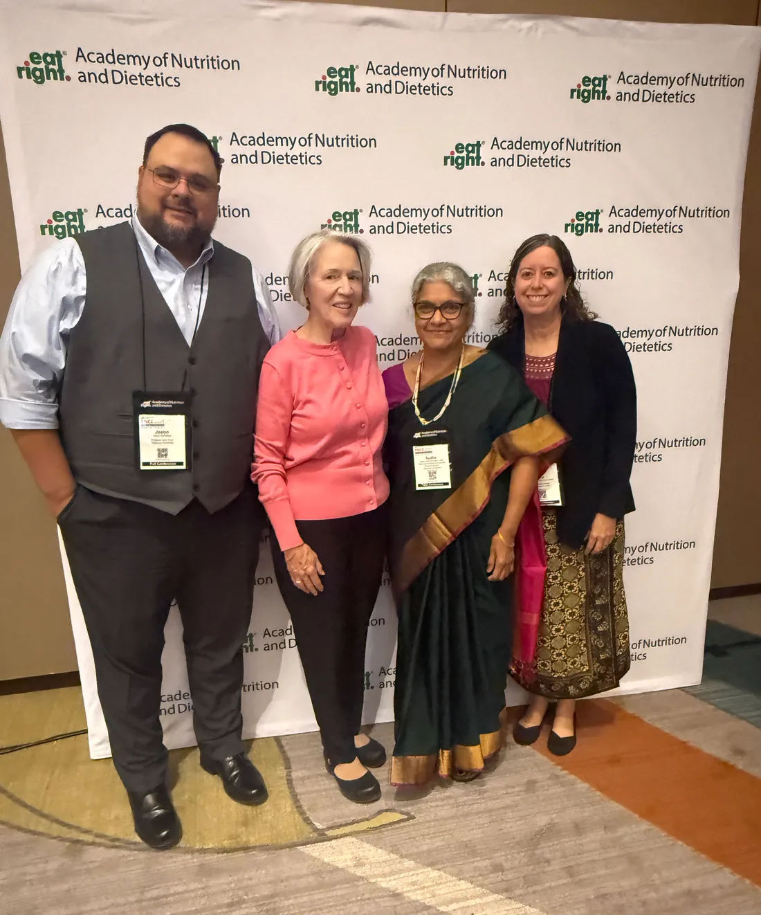 Sudha Raj standing with Jason DeFreitas and Kay Stearns Bruening