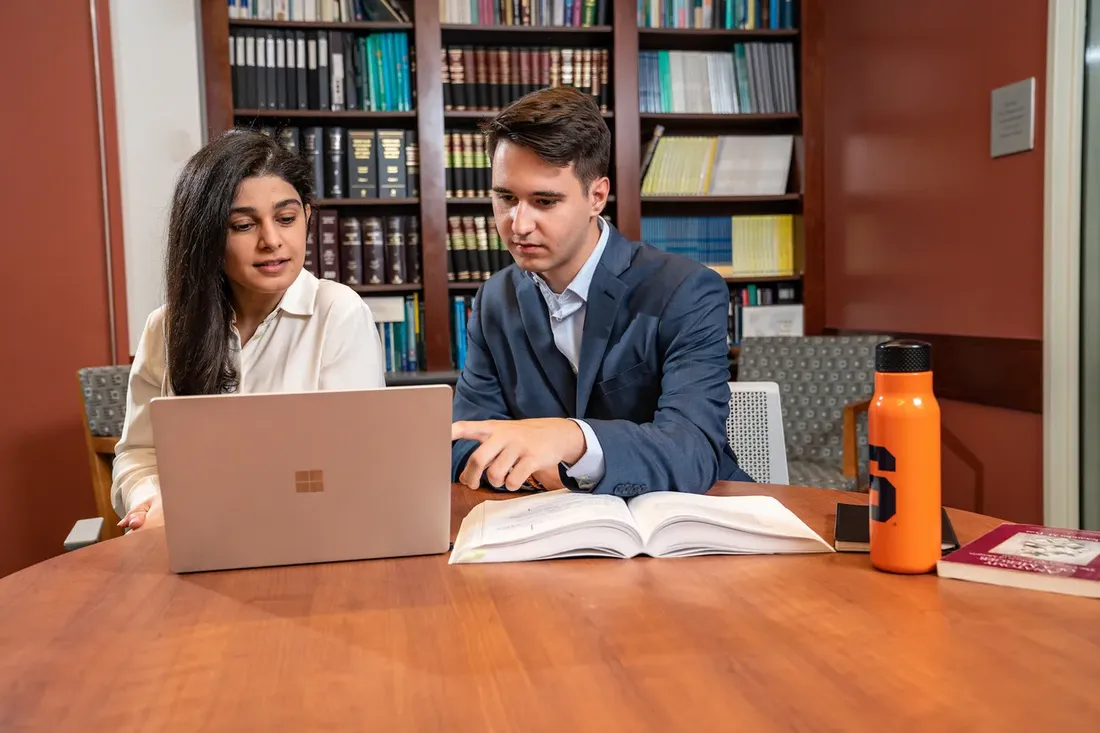A student meets with an academic counselor