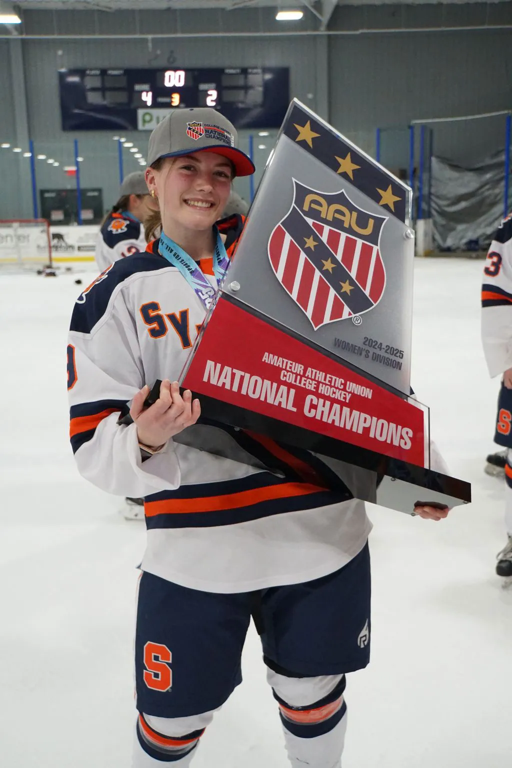 Jordan Boron holding national championship trophy