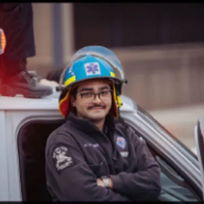 headshot of lechner in EMT uniform