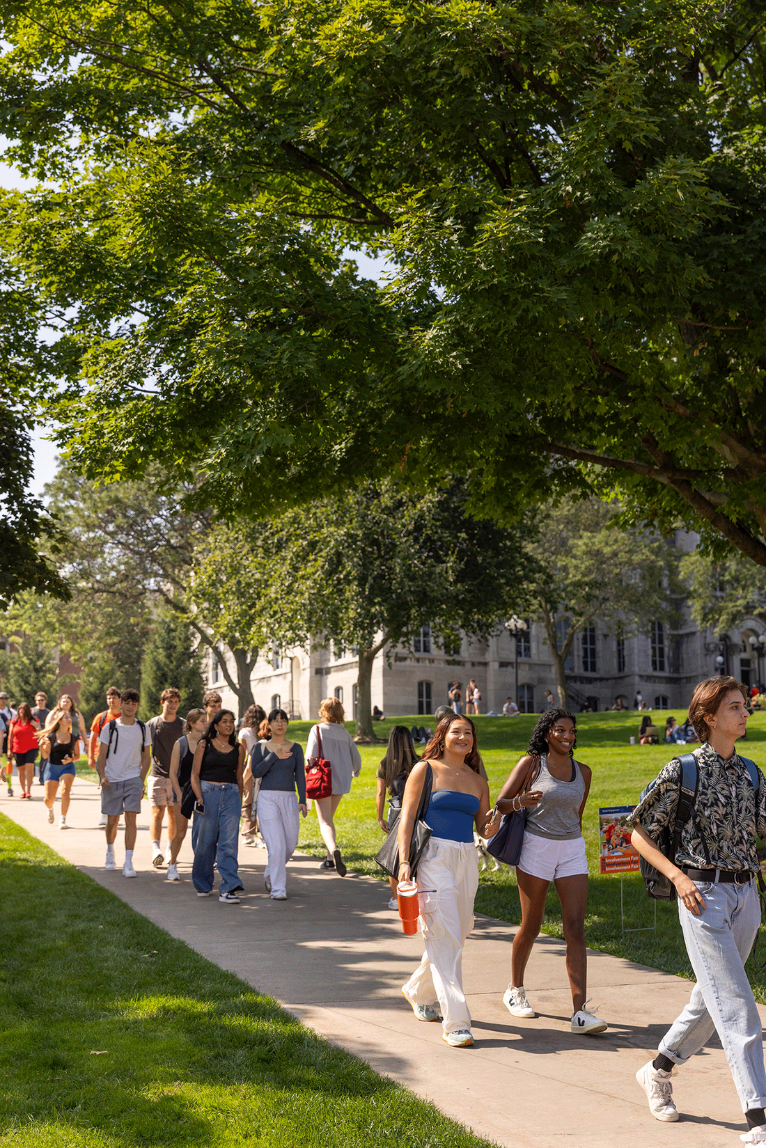new students walking on campus