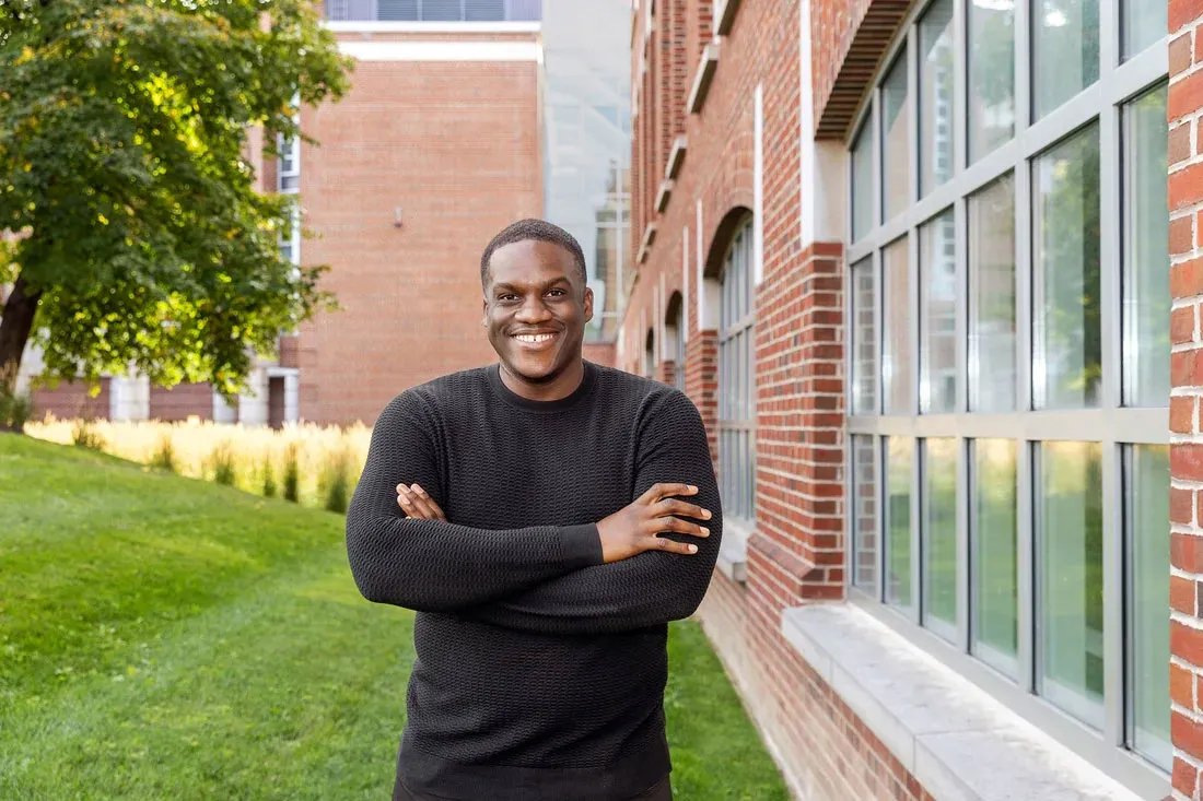 Jamal Salmon standing outside Falk College