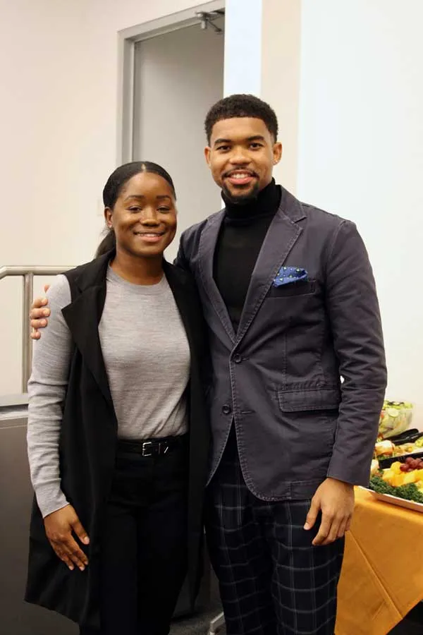 two people standing together