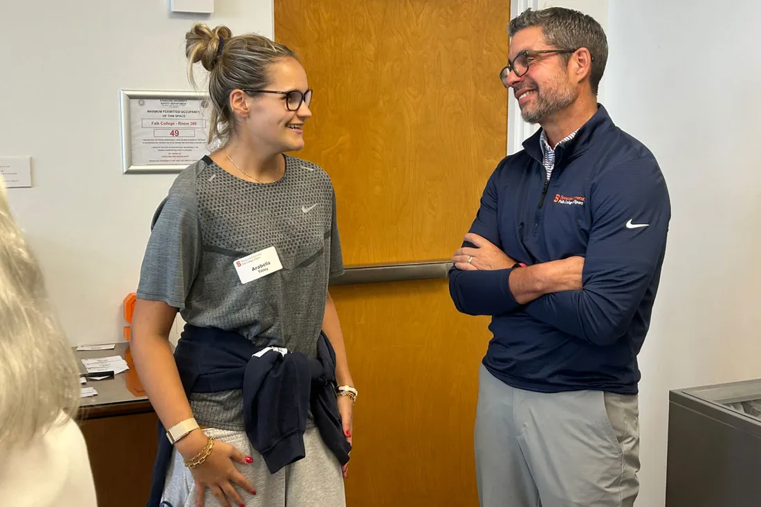 Dean Jordan talking with female student