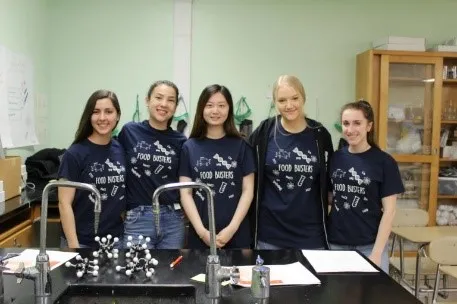 five students gathered together