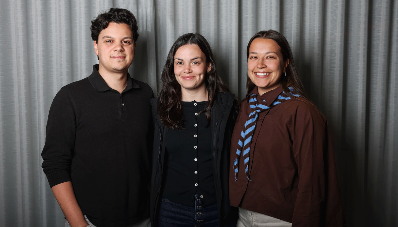 students sitting on couch talking