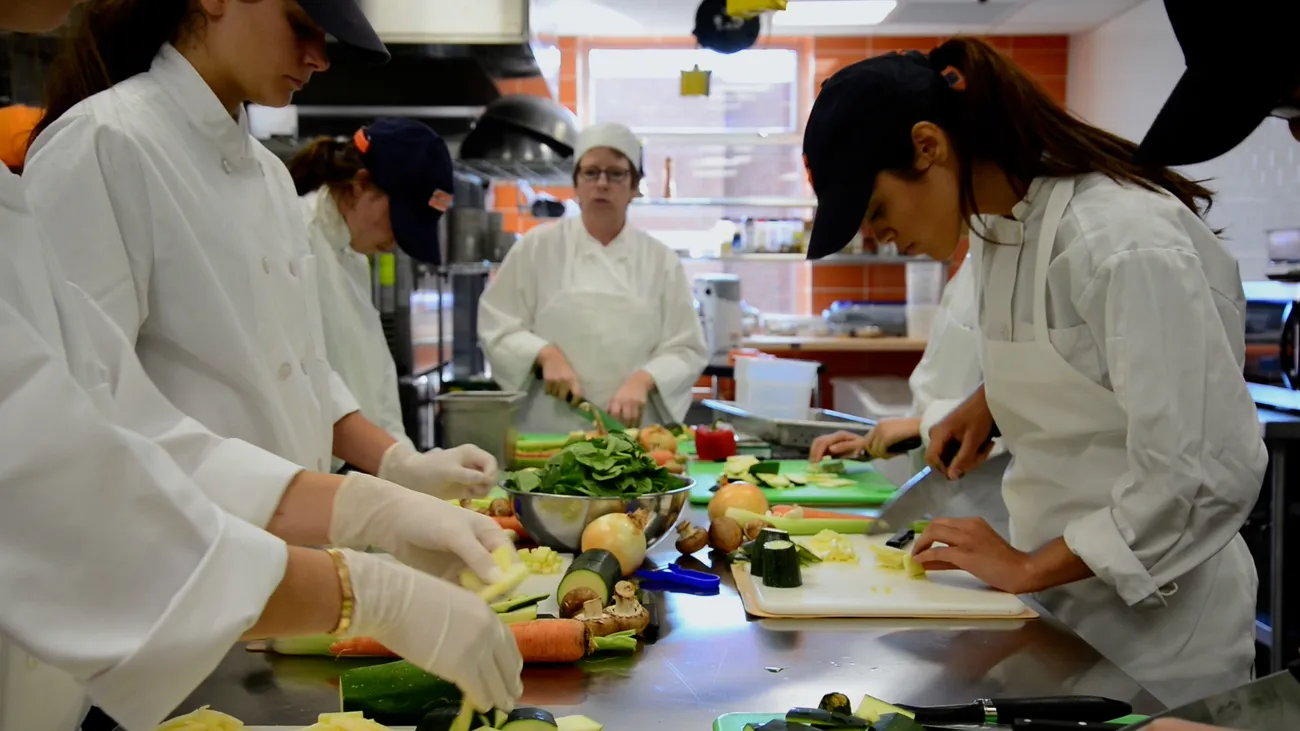 Students cooking in the Klenk learning kitchen