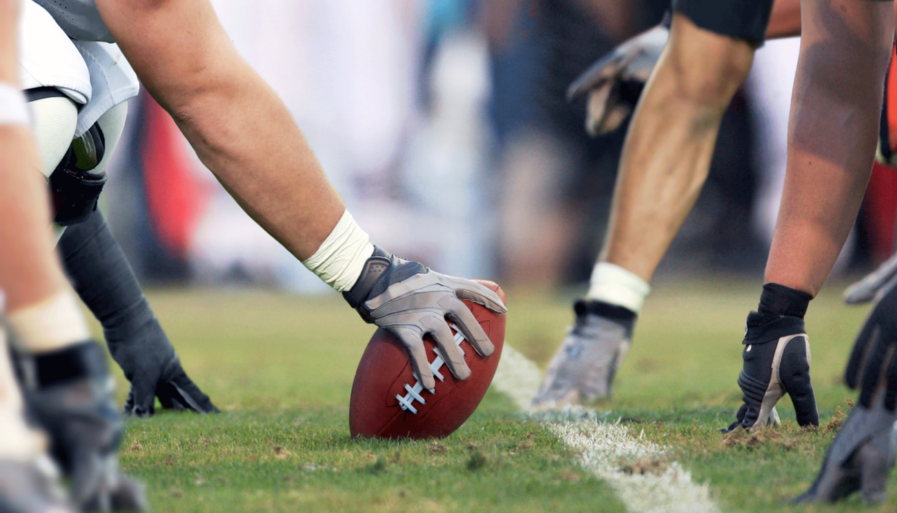 football and plays at the line of scrimmage