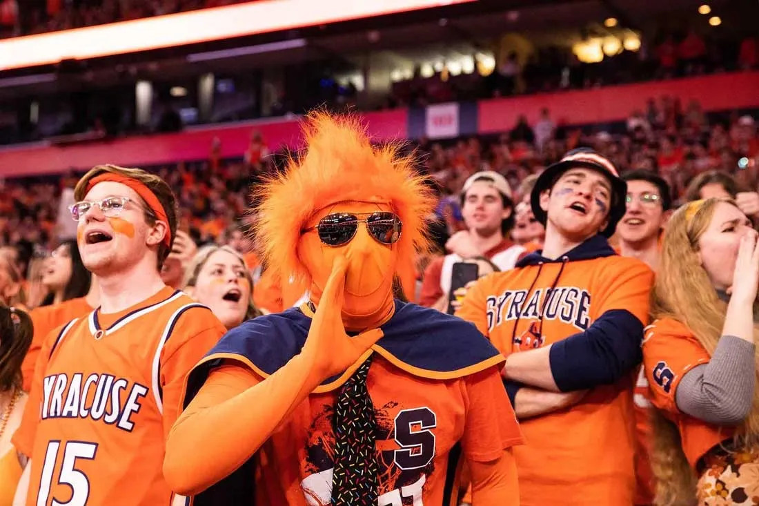 student dressed up in Orange to attend game