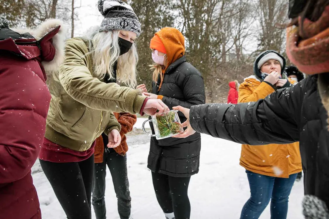 students outside foraging for berries