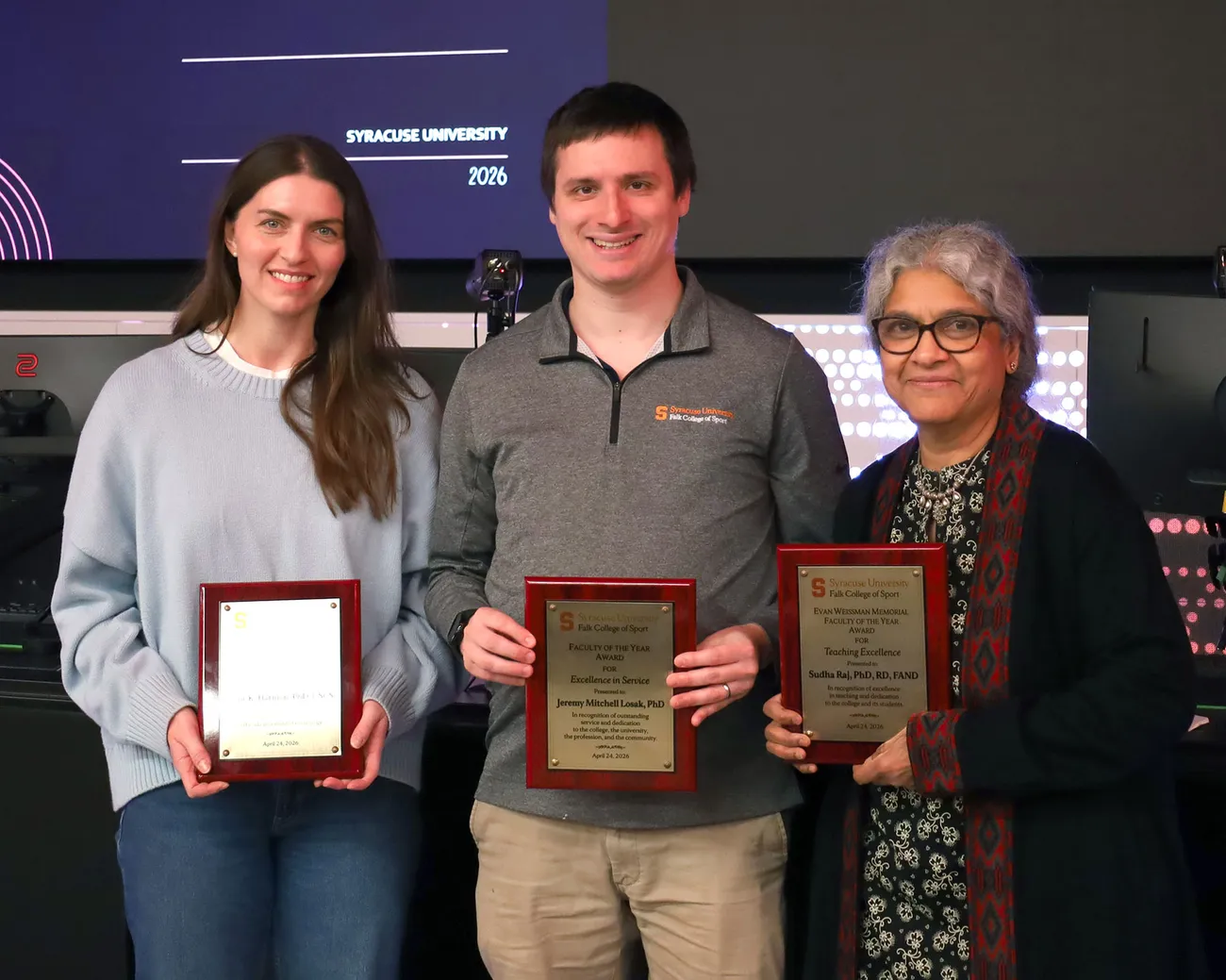Kylie Harmon, Ph.D., Jeremy Losak, Ph.D., and Sudha Raj, Ph.D. were recognized this semester during Falk College’s Faculty of the Year Awards