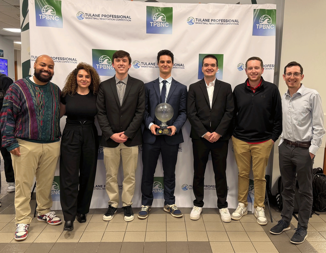 Seven winners of competition standing together