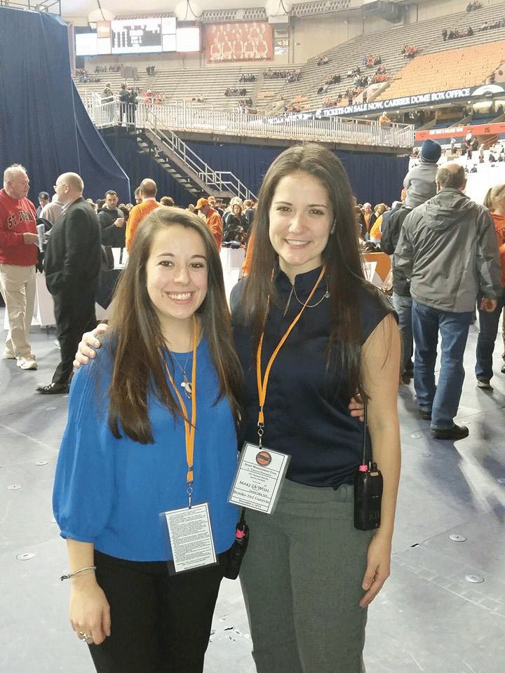 Hannah Rafferty standing next to a classmate at Charity Sports Auction