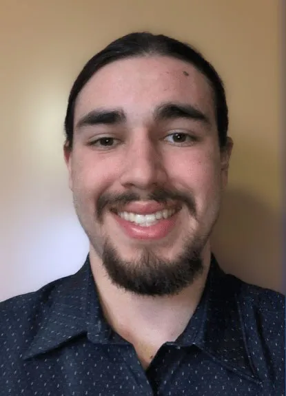 headshot of Corey Goldman
