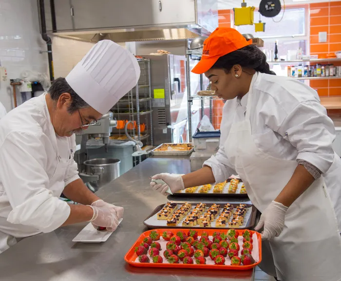 Student and chef in the Klenk Learning Kitchen
