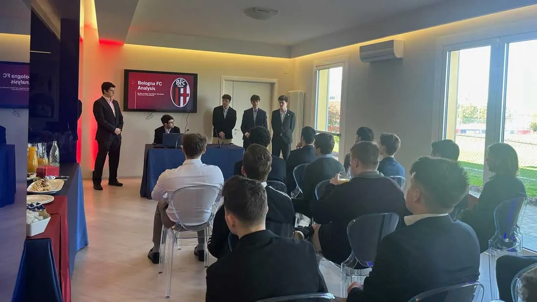 sports analytics students visiting Italy and attending presentation