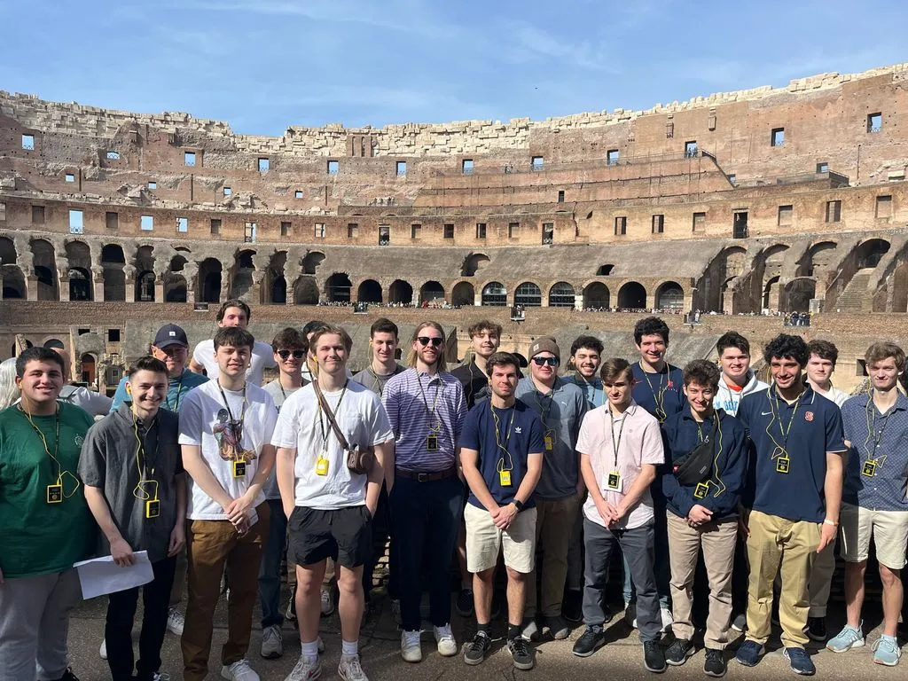 sports analytics students standing outside the Colosseum in Rome