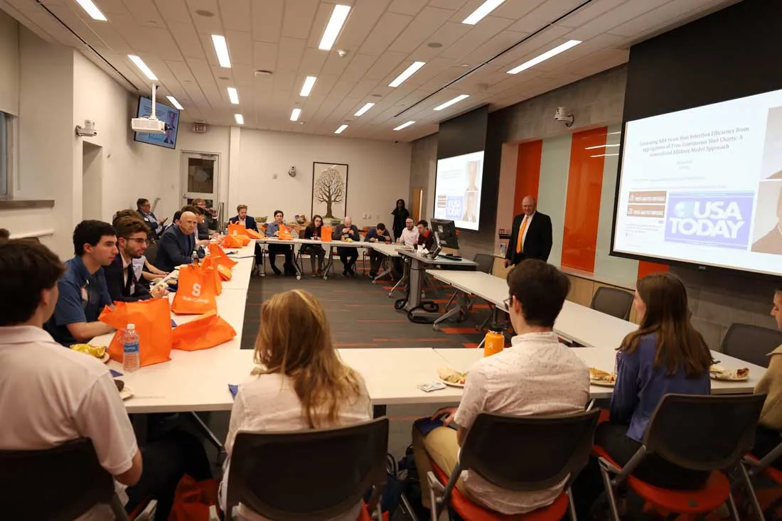 students sitting during presentation