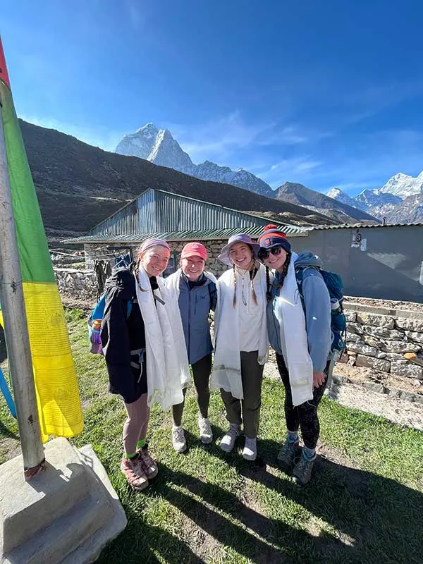 Head sherpa and wife gift four SU students with prayer scarves