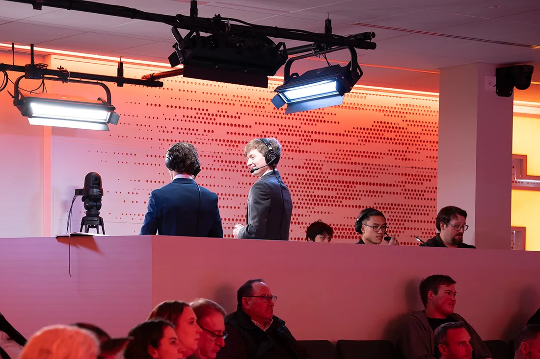 two student broadcasters in studio space