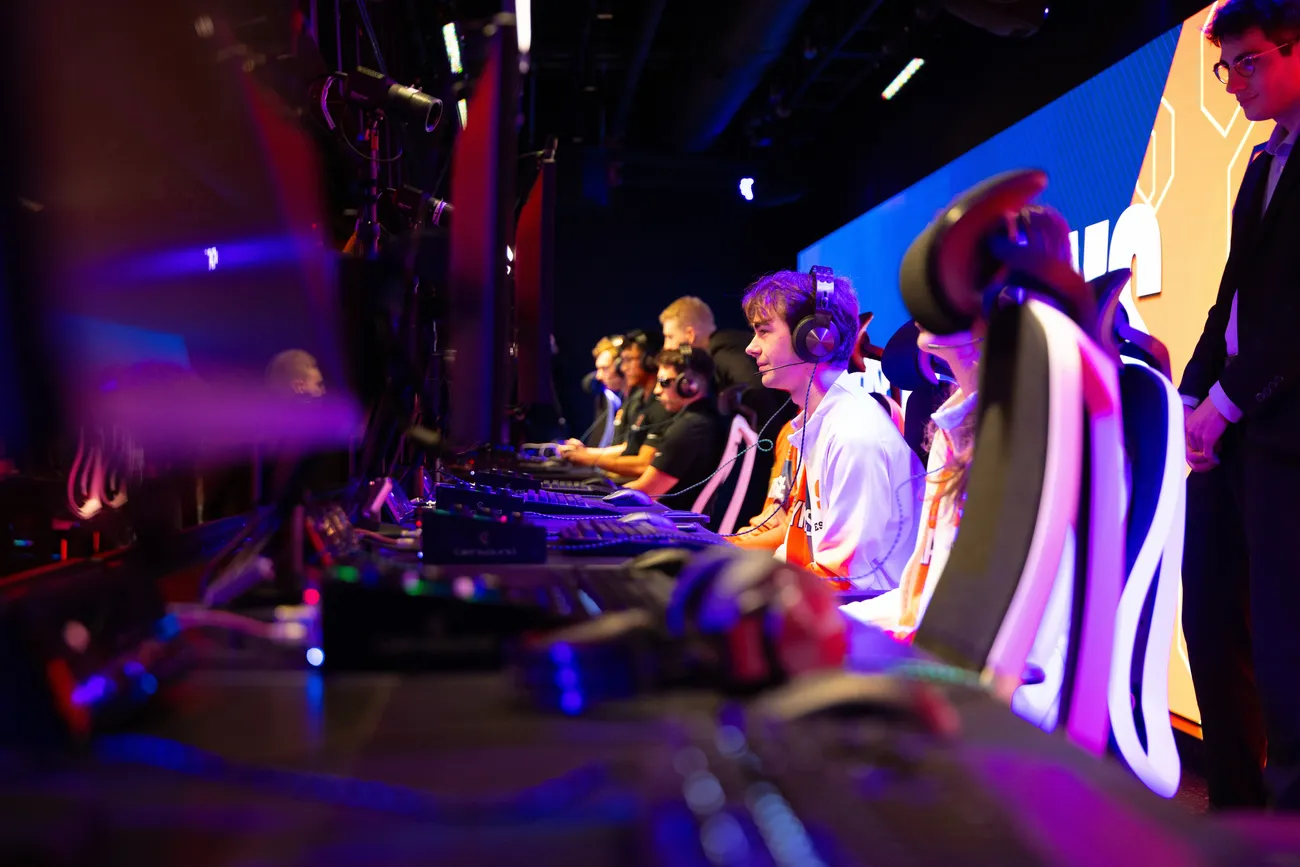 Students seated at gaming stations playing Rocket League