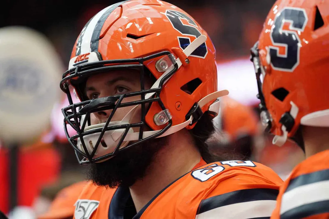 SU football player in full orange and blue gear