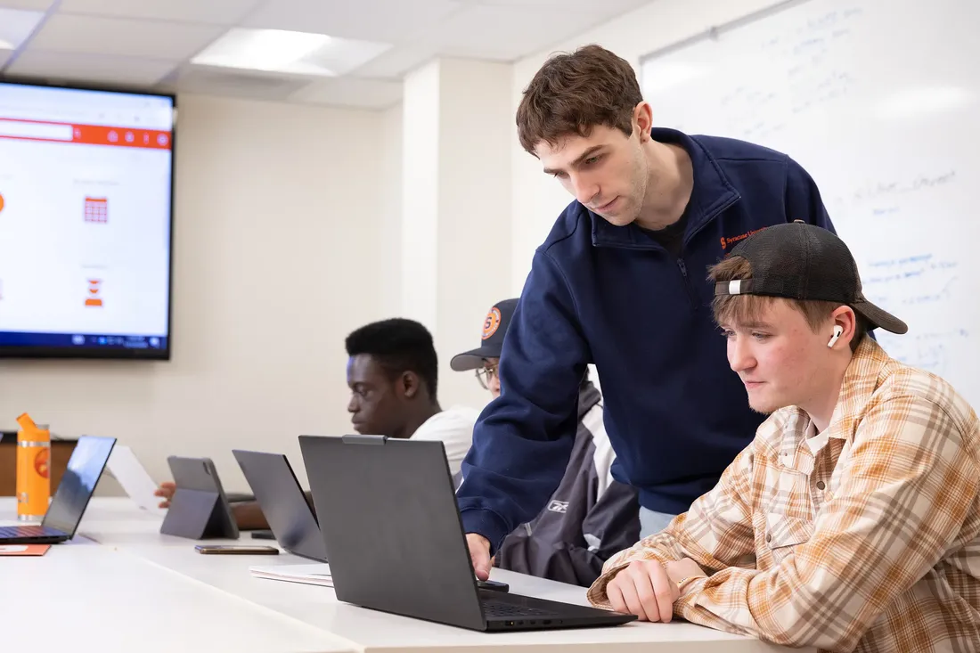 Students work together in a classroom