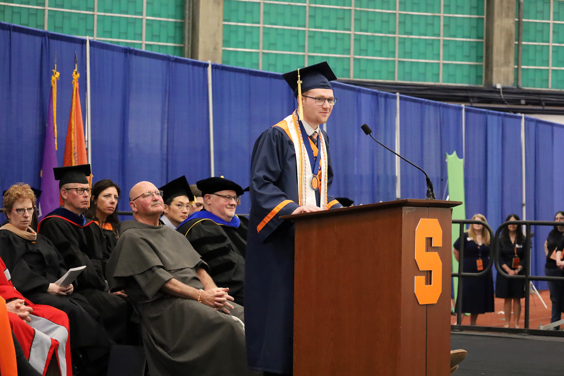 student delivers speach at convocation
