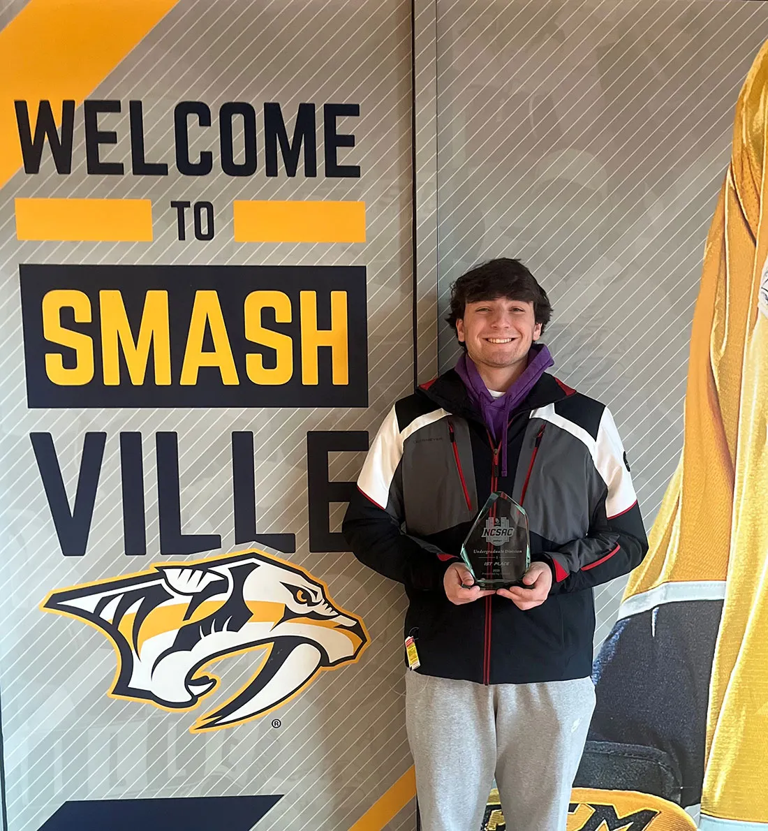Jonah Soos holding his trophy