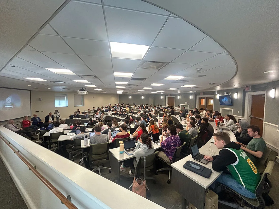 sport management students attending class in room 200 of Falk College