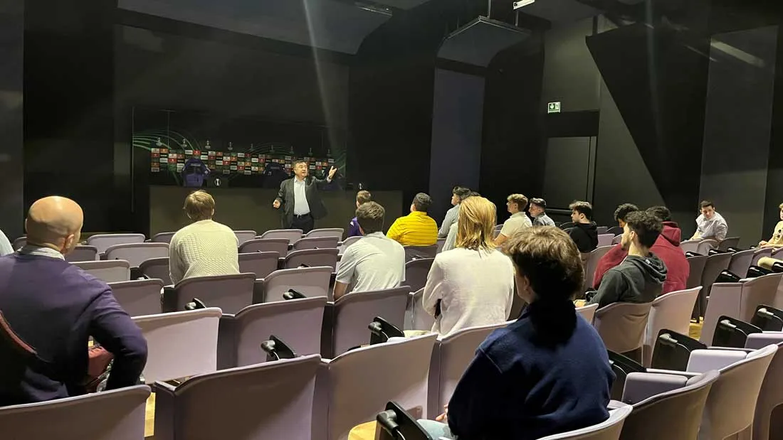 students visiting Italy listening to CEO Joseph Barone