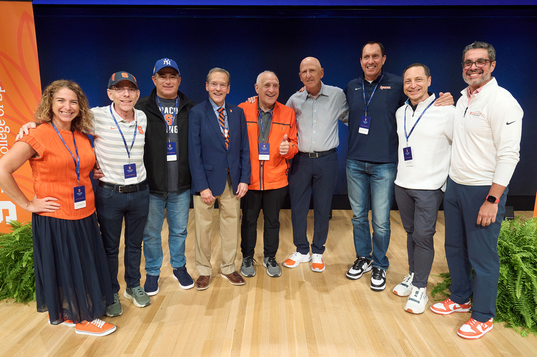 advisory board members and dean jordan standing together