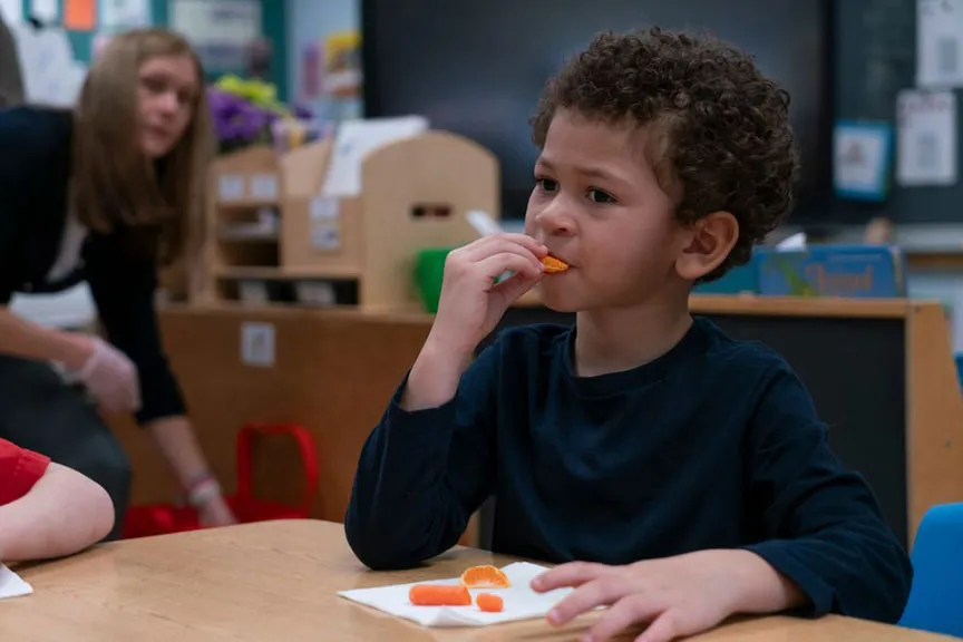 young male child eating