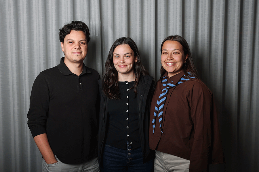 three internship students standing together