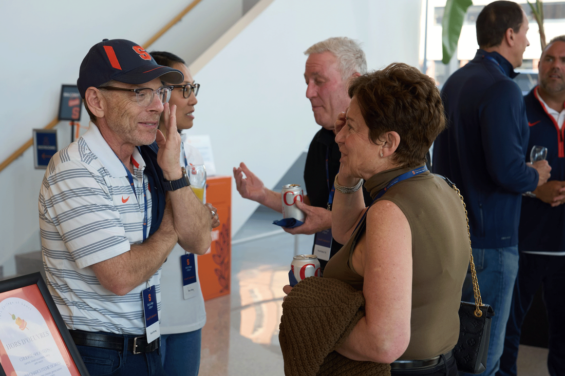 sandy montag speaks to some advisory board members, Patti Fallick