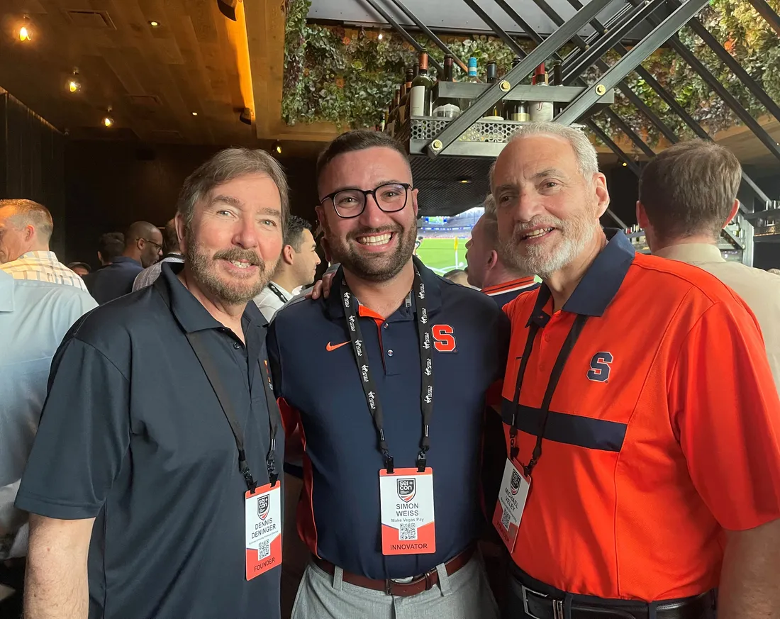 Dennis Deninger, Simon Weiss and Michael Veley standing together at SEICon conference in Las Vegas.