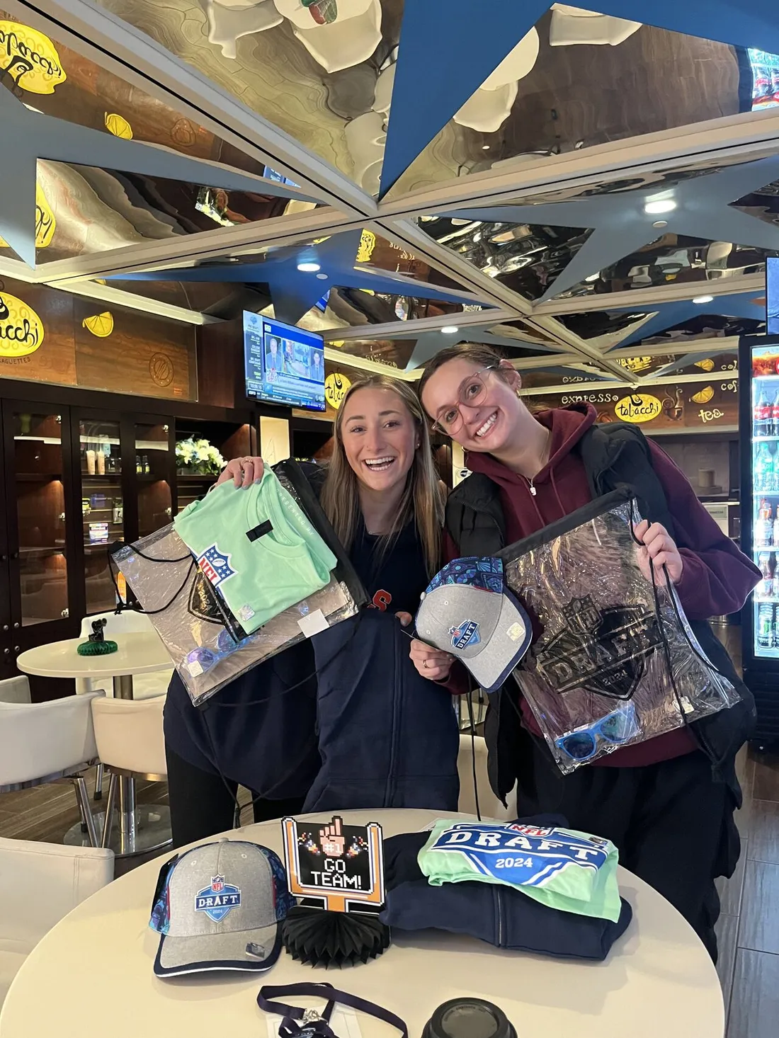 Two students interning at the NFL Draft in Detroit