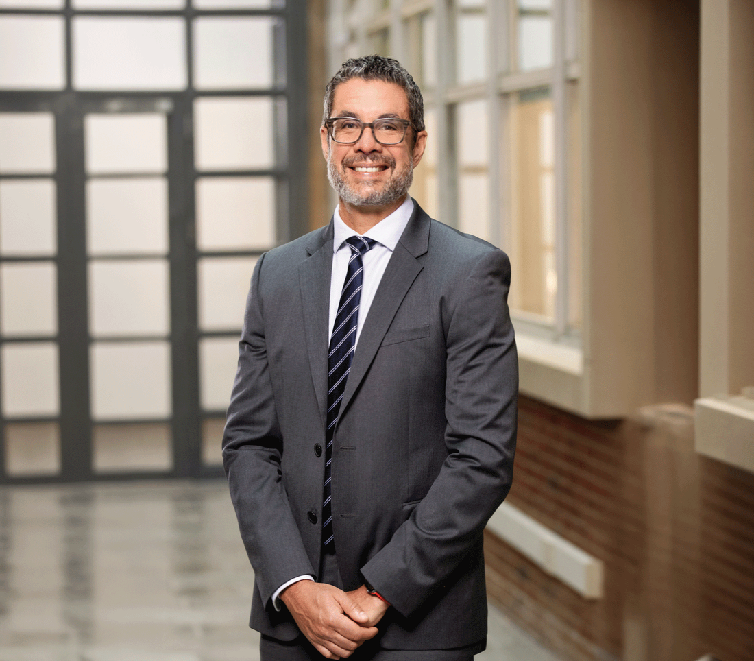 Dean Jordan standing in hallway