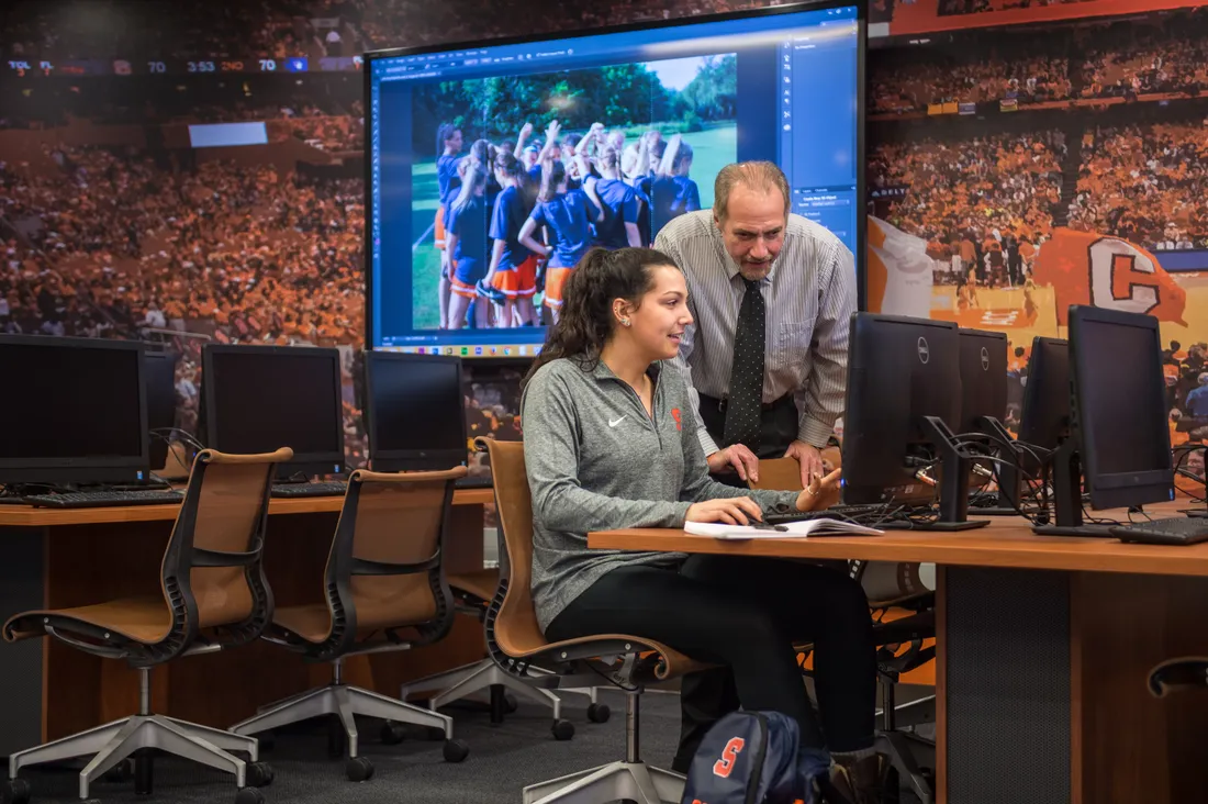 Former Director of Sport Management Michael Veley with a student