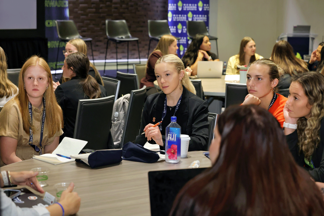 women attending sports conference