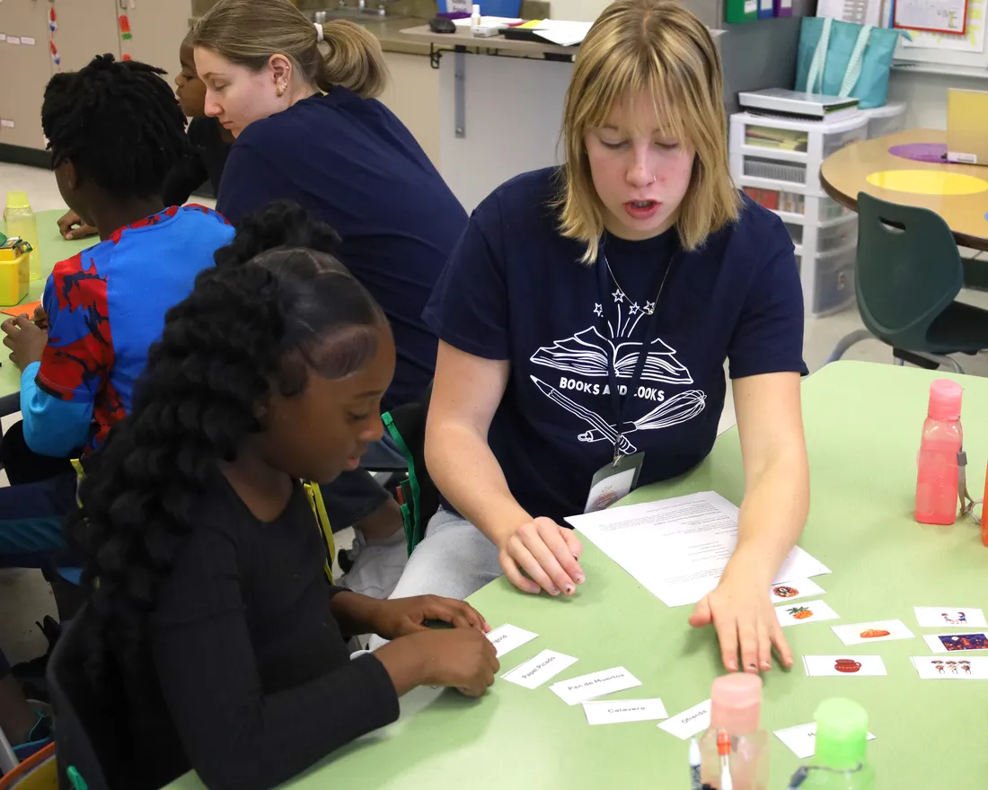 SU students engaging elementary students at Dr. Weeks elementary school