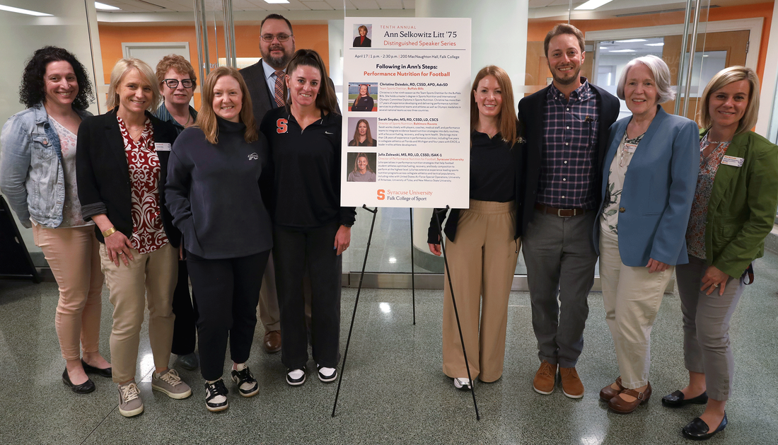 standing together Falk College of Sport faculty members from the Department of Nutrition of Food Studies join the three panelists and Jordan Litt, third from right, son of Ann Litt.