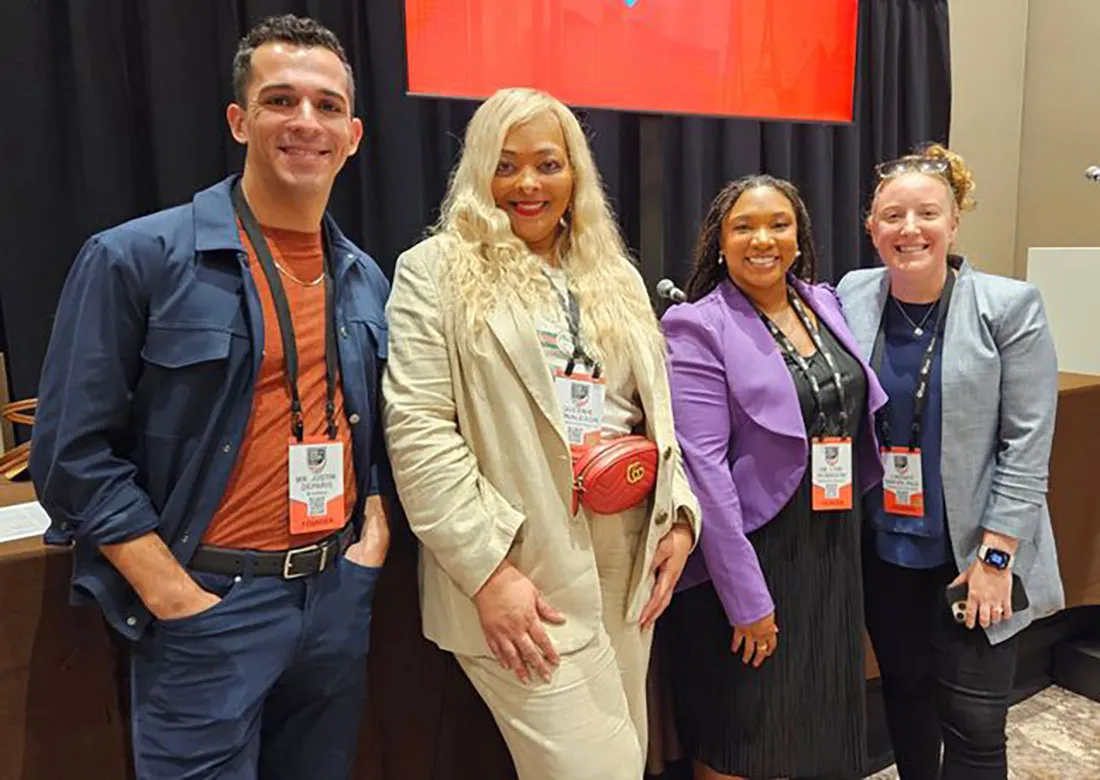 male broadway actor, female entertainment found, female spm alumnus and female professor stand together