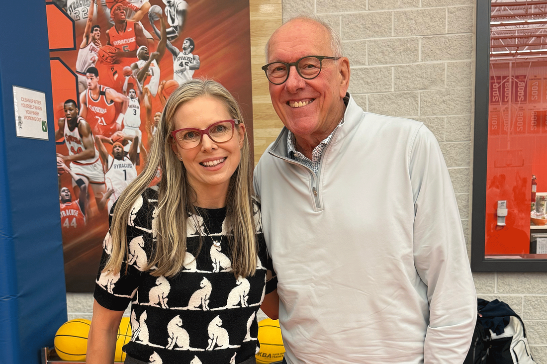 Cynthia Sass and Jim Boeheim standing side by side