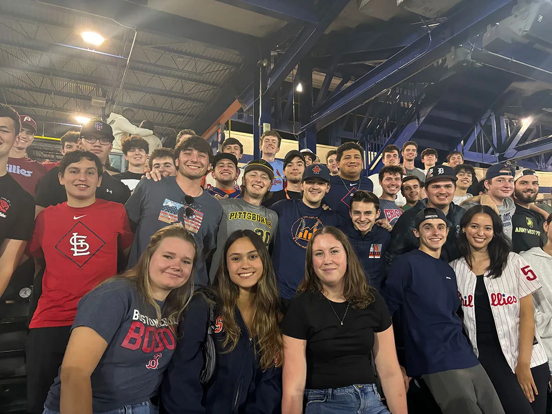 A group of students attend a mets game