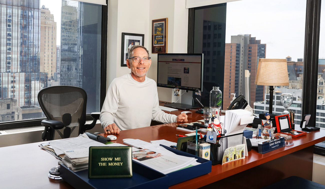 sandy montag sitting behind a desk