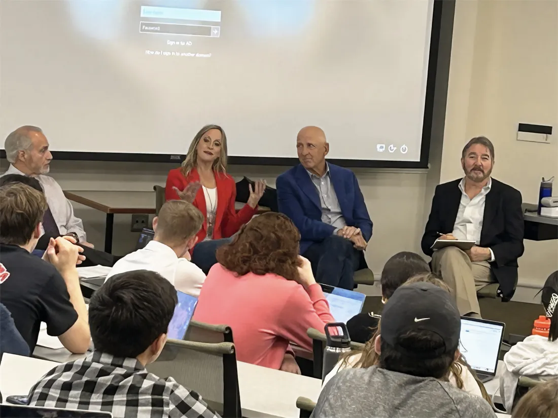 A group of people sitting in a room