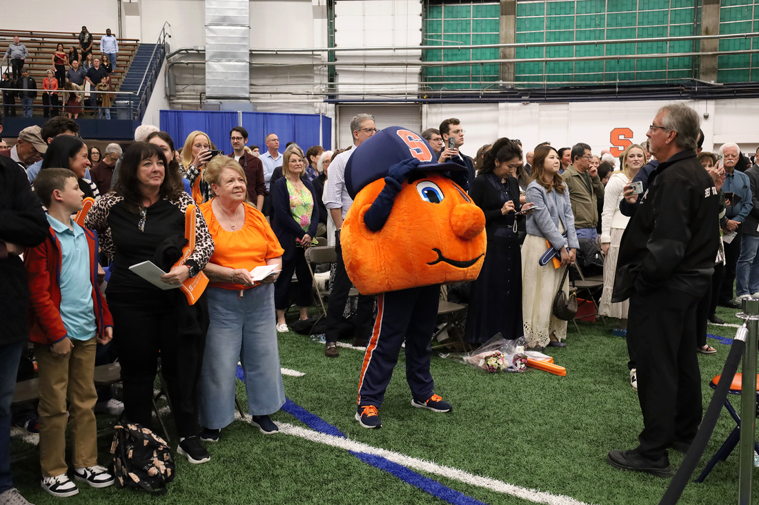 Otto sways with audience while the SU alma mater is sung